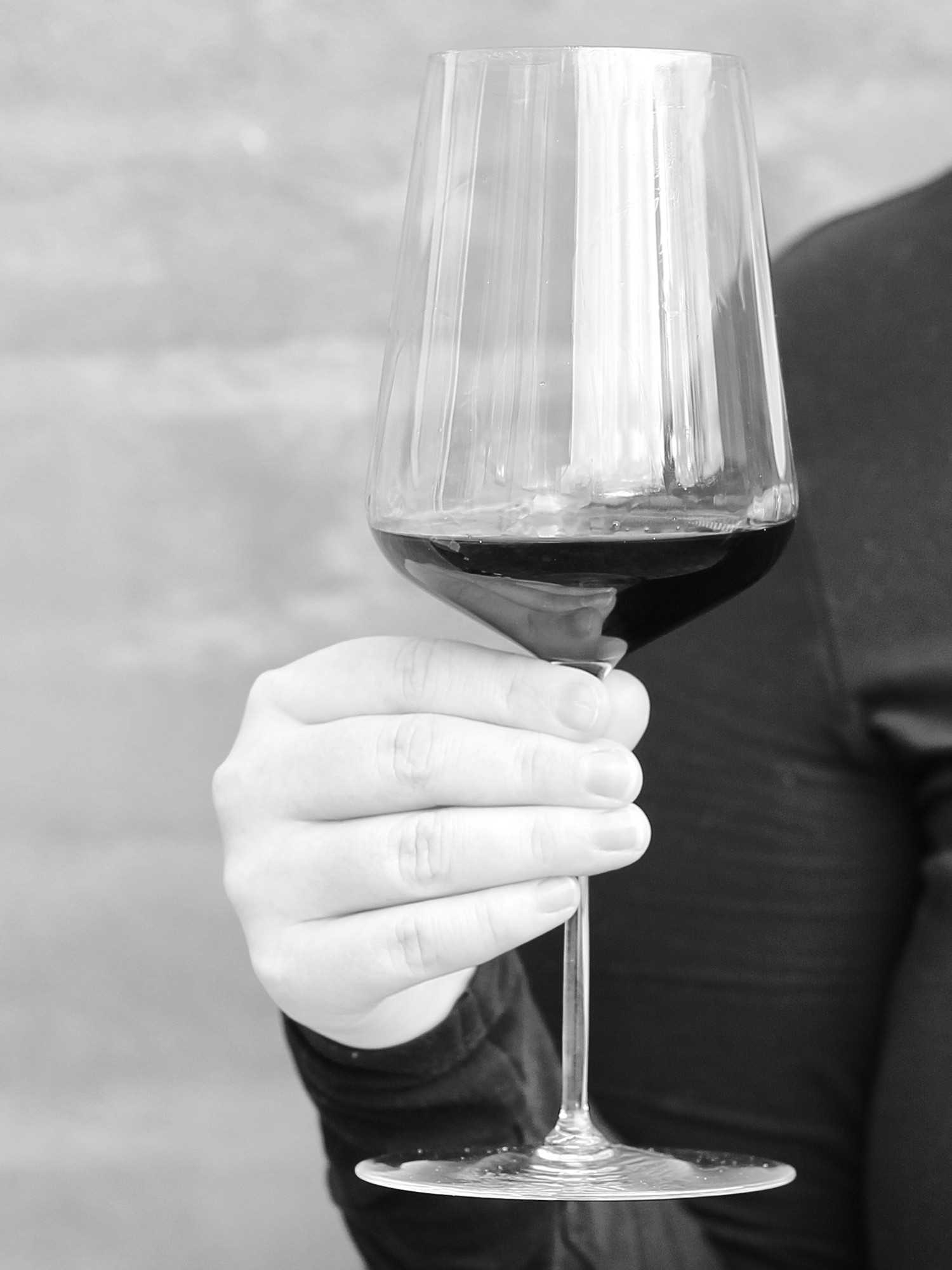 A wine glass in black and white